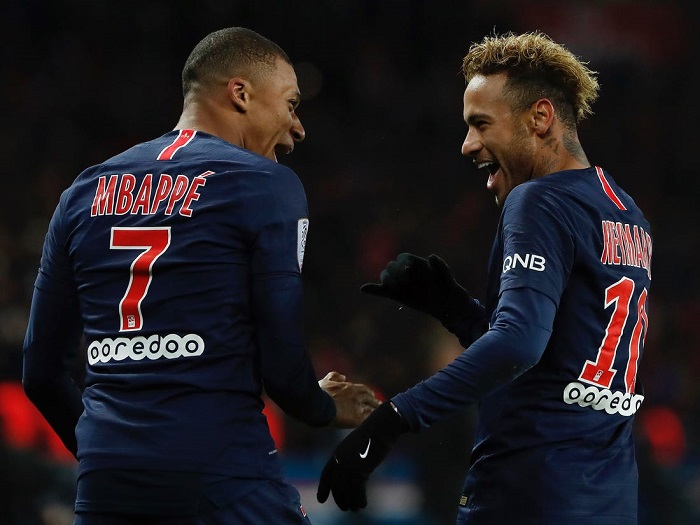 Paris Saint-Germain forward Neymar with team-mate Kylian Mbappe